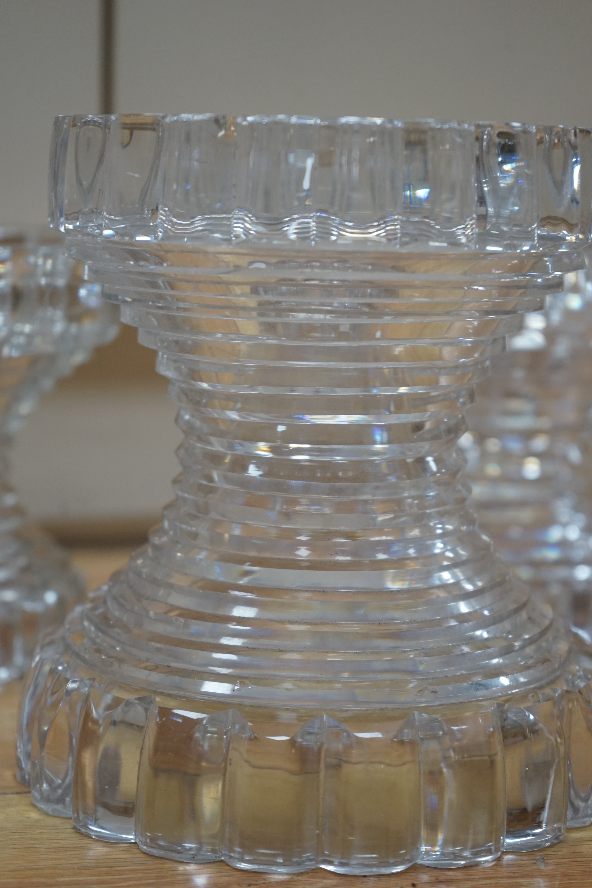 A set of three Regency cut glass pineapple stands, 19cm. Condition - several chips